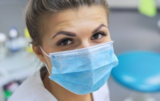 female doctor in protective medical mask
